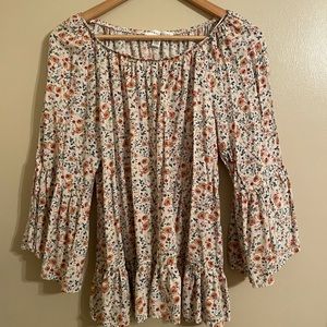 Floral top with bell sleeves
